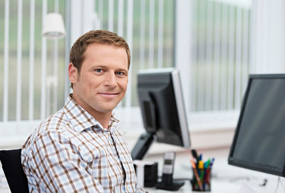 A man at a computer
